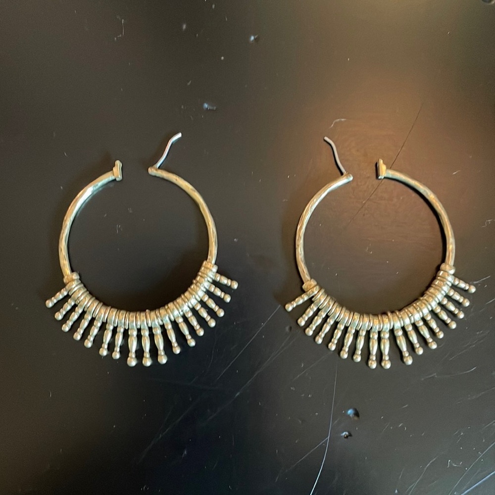 Gold hoop earrings, please see pictures for details. & thanks for looking!